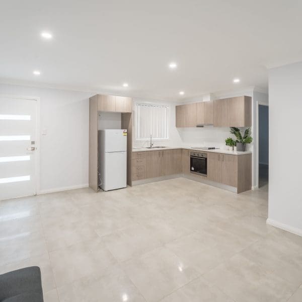 Forrester Road Granny Flat NDIS housing kitchen and couch